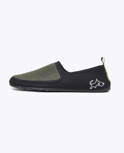 Olive green and black slip-on shoe, lightweight, with dog outline detail and speckled sole